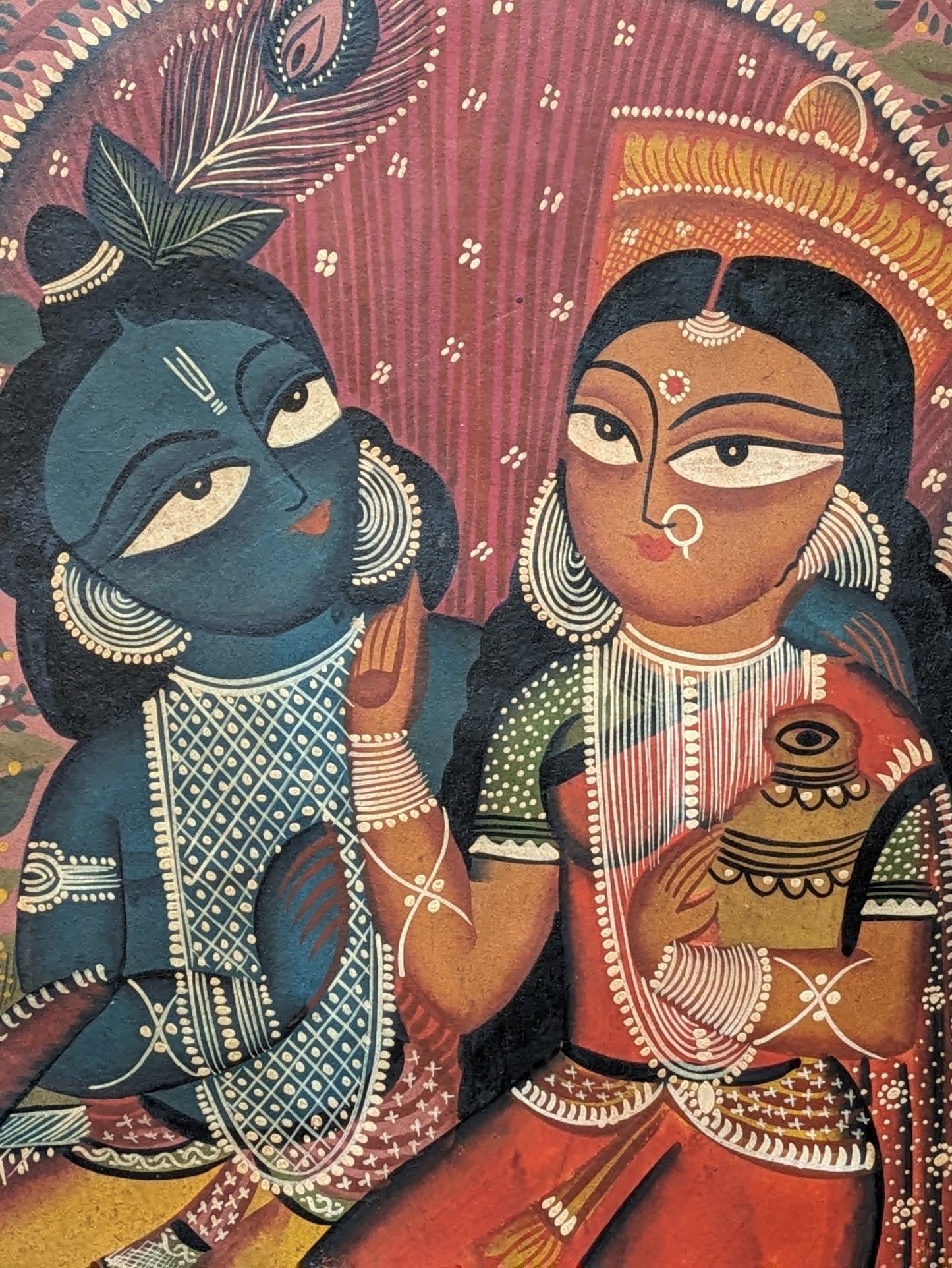 Radha and Krishna on a swing - by Uttam Chitrakar