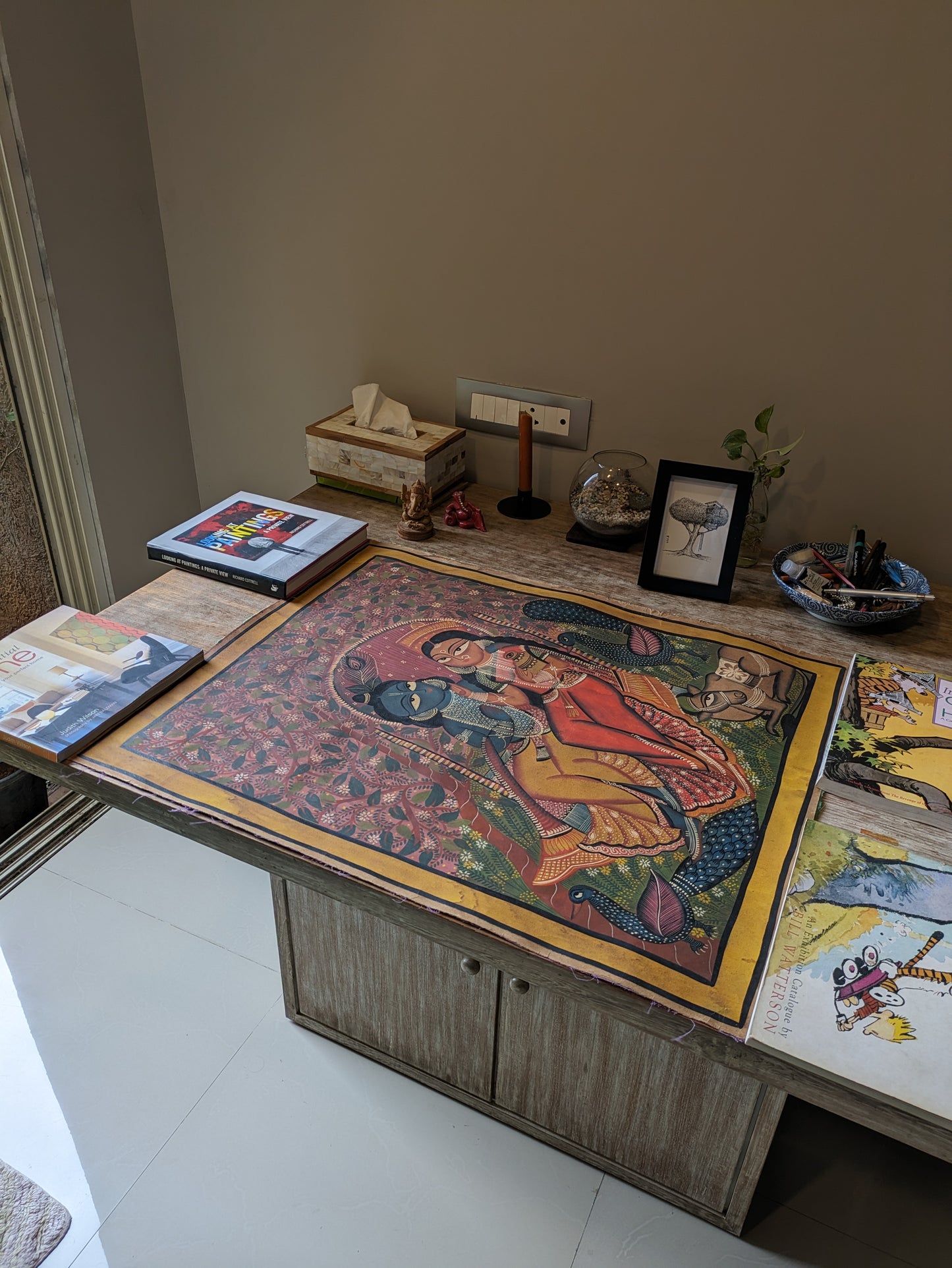 Radha and Krishna on a swing - by Uttam Chitrakar