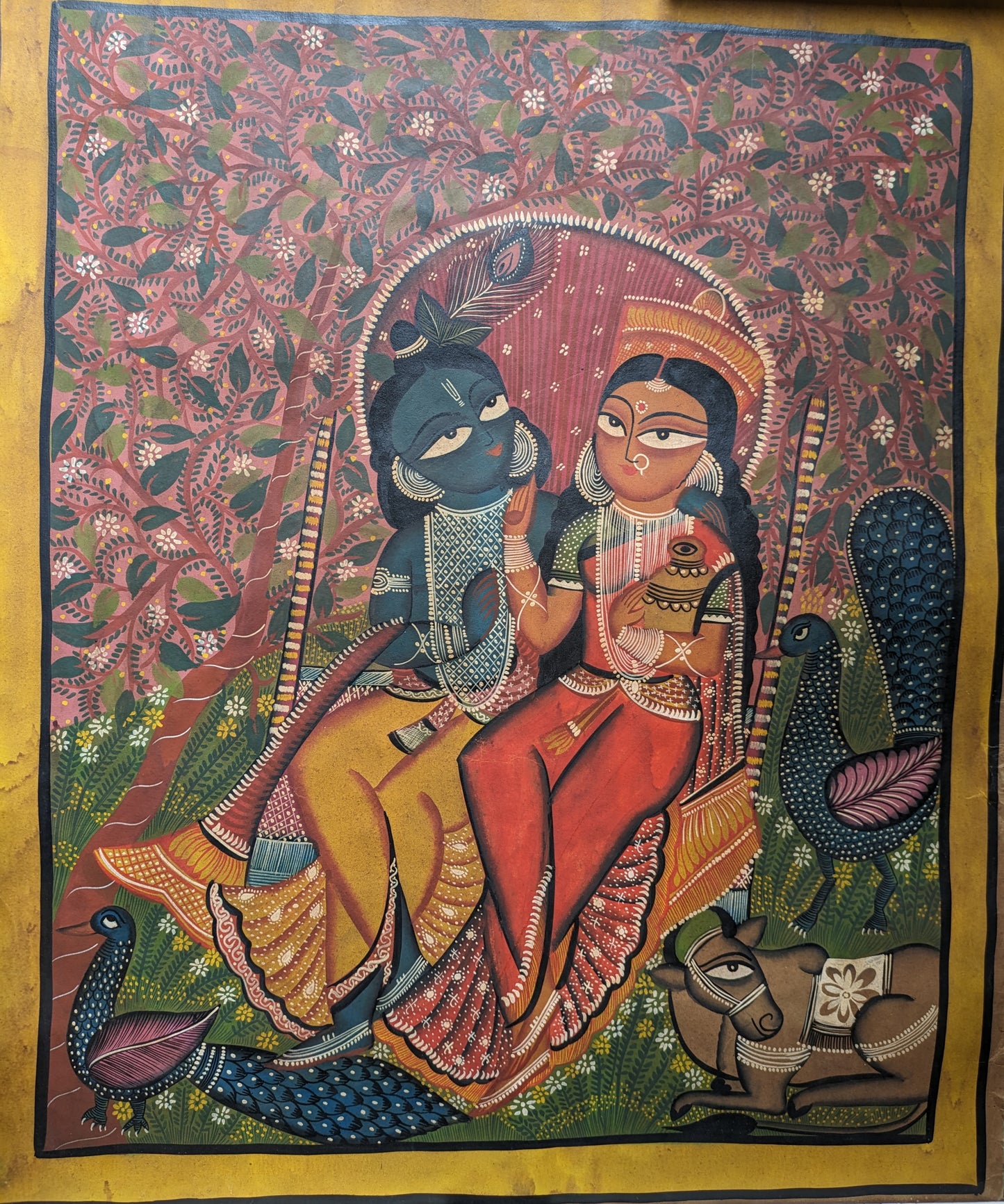 Radha and Krishna on a swing - by Uttam Chitrakar